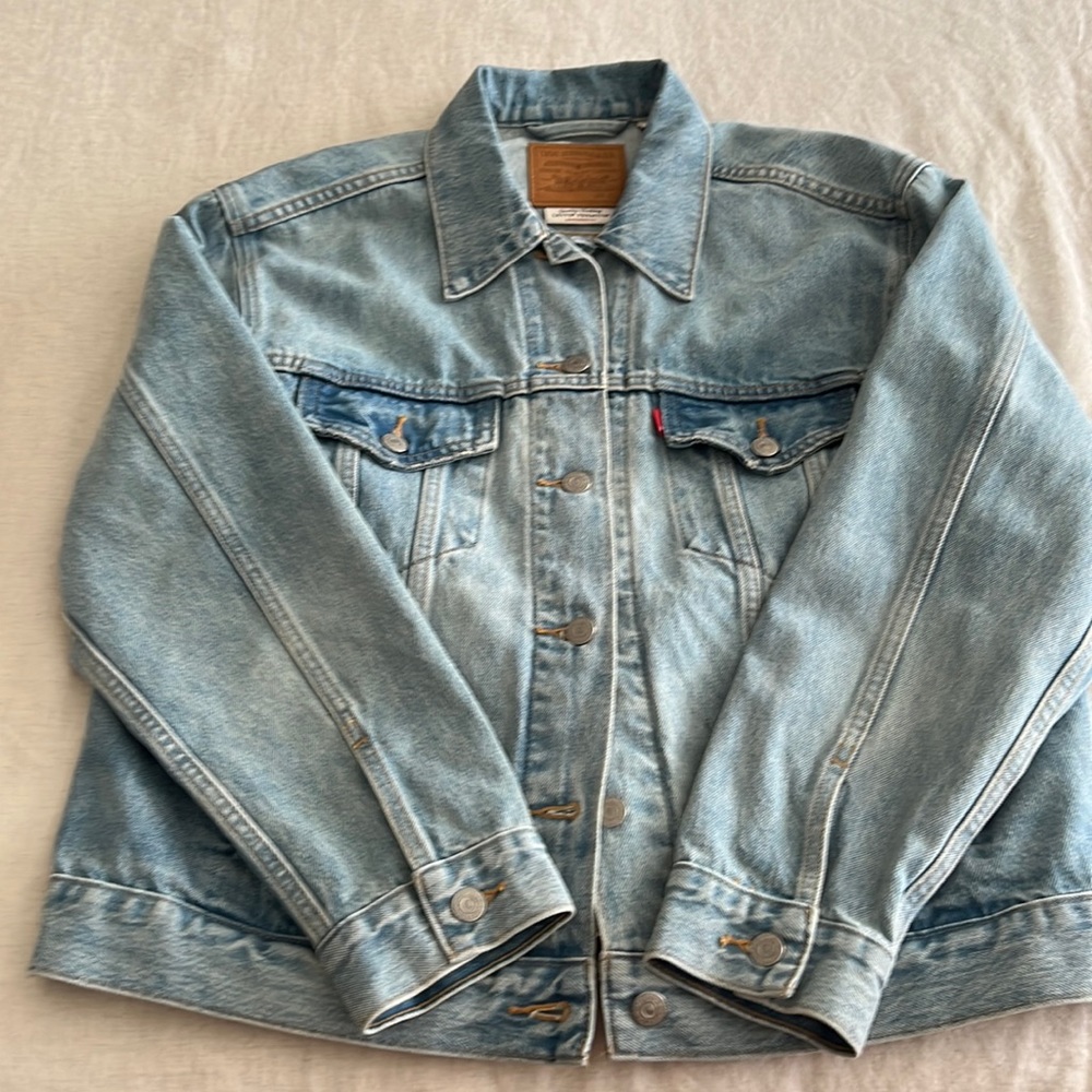 Unique “Trucker’s Faded Denim Jacket”.